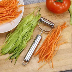Areeb Mart stainless steel julienne vegetable peeler with ergonomic handle, designed for peeling and julienning vegetables in the kitchen.